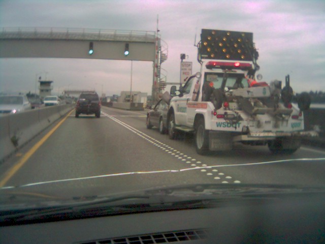 WSDOT truck pushing car